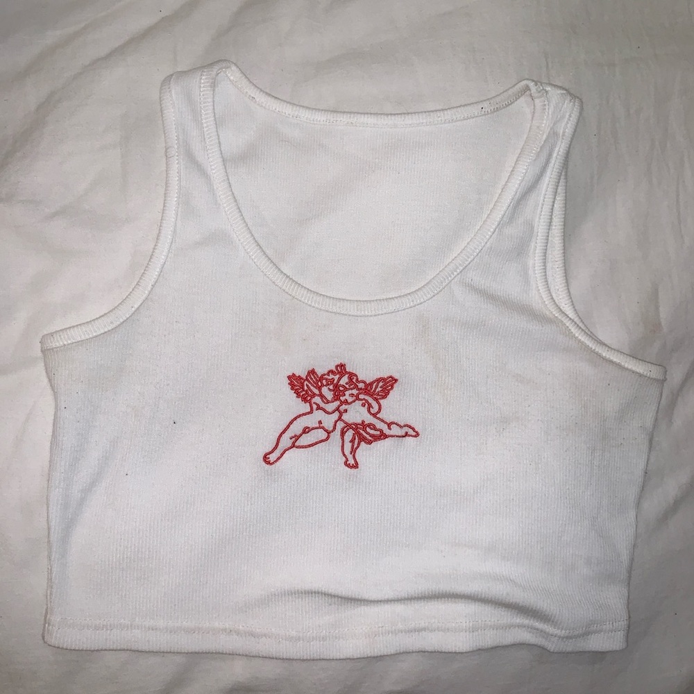 White crop tank with angel stitching, worn once!